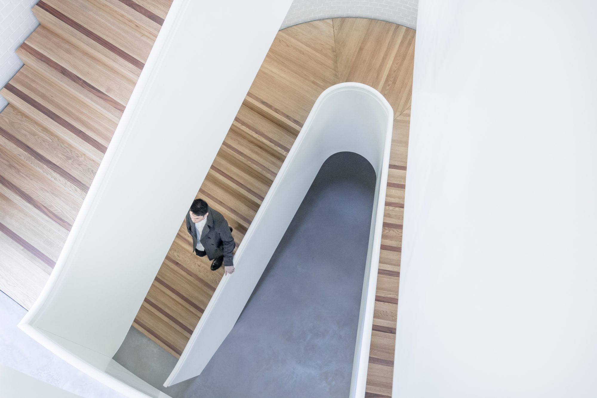 A man walking down the stairs